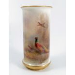 A Royal Worcester vase, of cylindrical form, decorated to the front with pheasants in landscape by