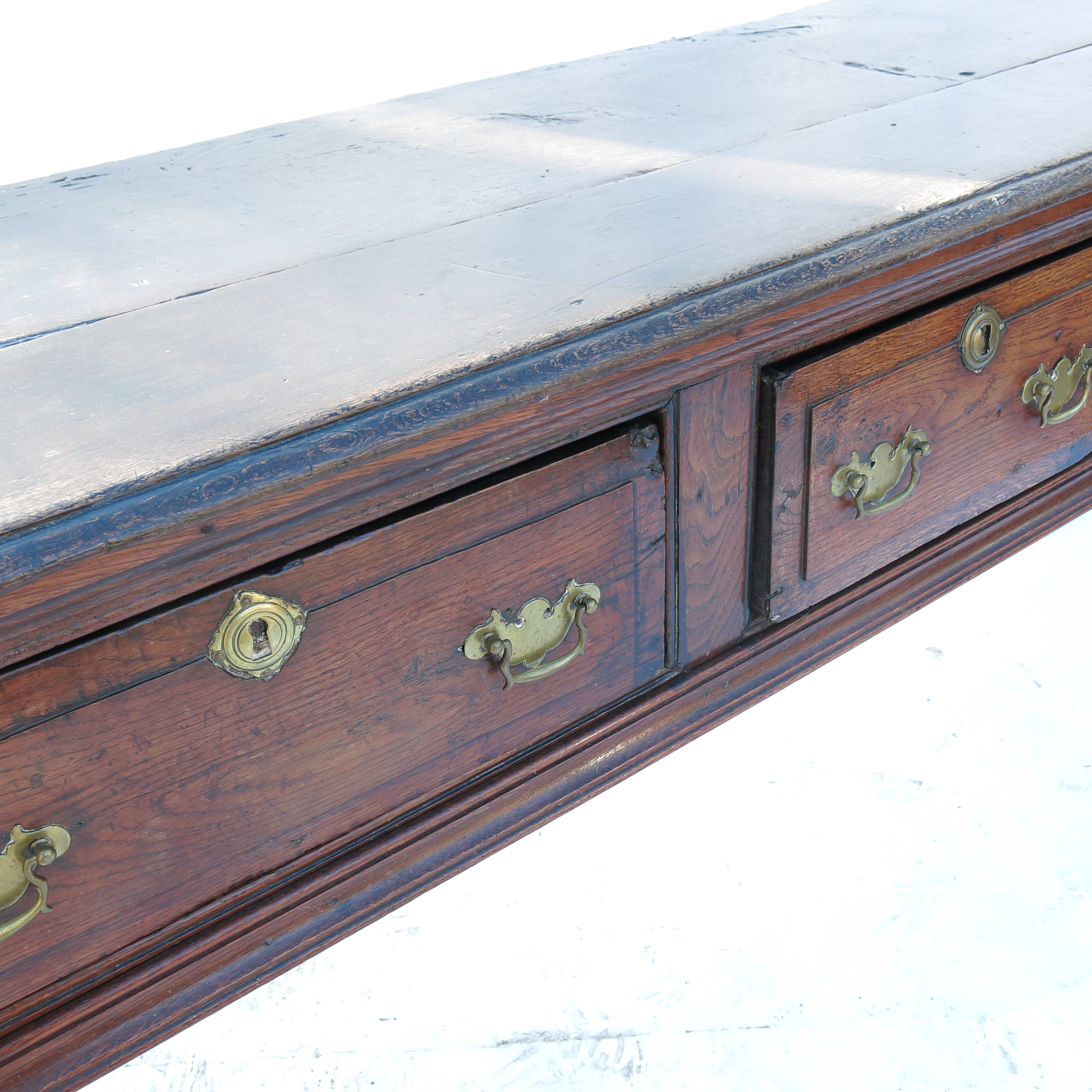 A Georgian style oak three drawer dresser base, with baluster profile front legs, width - Image 3 of 3