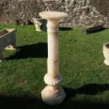 A pedestal, with turned column, raised on a pedestal base, height approximately 42.5ins