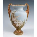 A Royal Worcester pedestal vase, decorated with four Swans in flight and foliage to a powder blue