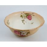 A Royal Worcester blush ivory bowl, with shaped edge, decorated inside and out with floral sprays,