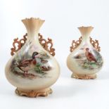 A pair of Locke & Co Worcester blush ivory vases, having a pair of pierced scroll handles, the