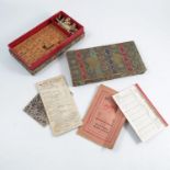 A cased Mah Jong set, approximately 144 bamboo tiles, with counters, instructions etc