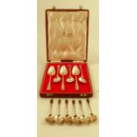 A cased set of six silver grapefruit spoons, Sheffield 1964, retailed by Harrods, weight 4oz,