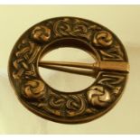 A pen-annular style metal brooch, by Alexander Ritchie, stamped 'AR' and 'Iona', in the Celtic