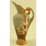 A Royal Worcester ewer, decorated with four swans on a powder blue ground, with a swallow to the