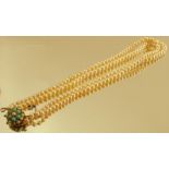 A two graduated row cultured pearl necklace, the 85 and 87 pearls of approximately 3.6mm to 7.6mm,