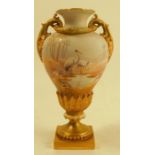 A Royal Worcester vase, decorated with storks in a desert oasis within an all around landscape to