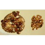 A 9 carat gold garnet set brooch, 8g gross, together with an Edwardian seed pearl set bow brooch