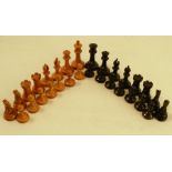 A Staunton turned wooden chess set, height of king 2.75ins together with various other chess