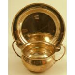 A silver circular dish, Sheffield 1921, weight 4oz diameter 6ins, together with a silver two handled