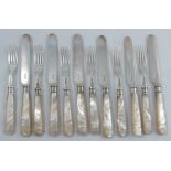 A set of six silver and mother of pearl dessert knives and forks, Sheffield 1898, together with