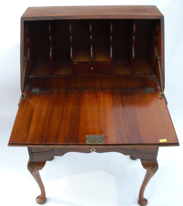 A Queen Anne style walnut bureau, the fall flap opening to reveal a fitted interior, over three long - Image 2 of 2