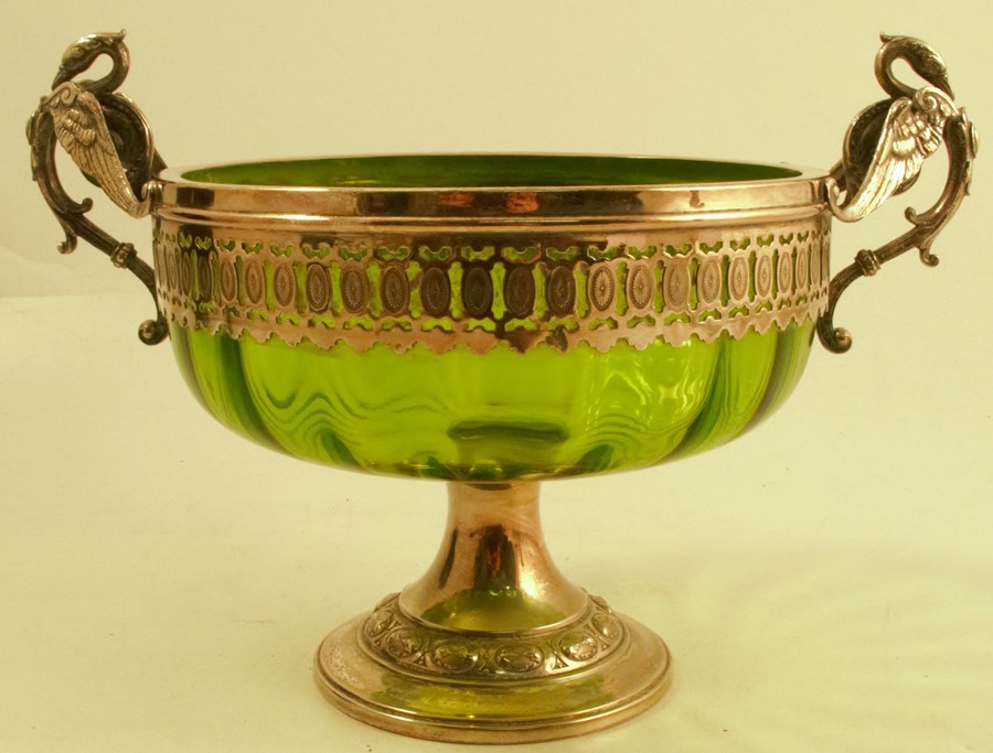 A WMF glass and silver plated bowl, the green glass body moulded with stylised griffin and raised on