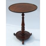 A 19th century mahogany occasional table, raised on a turned baluster column with circular base,