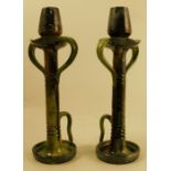 A pair Thulin Belgium pottery chamber sticks, in the style of Christopher Dresser, decorated in