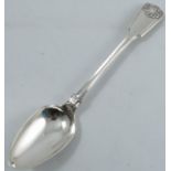 A Georgian silver serving spoon, in the fiddle thread and husk pattern, being double struck London