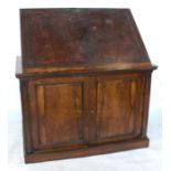 A 19th century rosewood library folio cabinet, having a leather inset metamorphic writing top, the