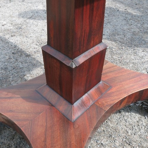 A 19th century rosewood fold over card table, raised on a turned column, on a base with claw feet, - Image 4 of 4