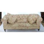 A Victorian button back chesterfield, with feather filled cushions