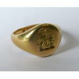 An 18 carat gold crested signet ring, finger size J, 6g grossCondition Report: Small amount of