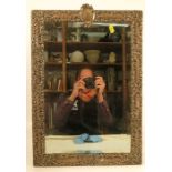 A silver mounted dressing table mirror, with rectangular bevelled glass, the frame decorated with