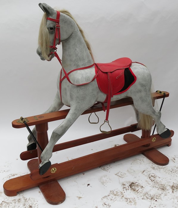 Robert Mullis Rocking Horse Maker, Wroughton, Swindon, a painted dapple grey rocking horse, with red