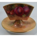 A Royal Worcester cigarette holder, decorated all around with fruit to a mossy background by H