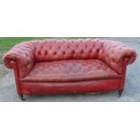 A circa 1900 button back red chesterfield