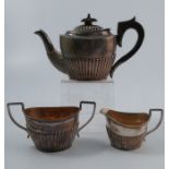 A silver three piece batchelor's tea set, with gadrooned lower body, Birmingham 1893, weight 14oz