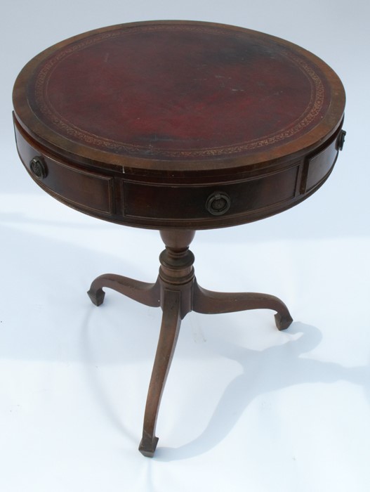 A mahogany drum table, fitted with three short drawers and three dummy drawers, raised on a turned - Image 2 of 3