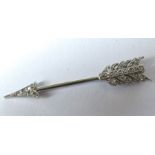 A rose diamond set arrow jabot pin, in unmarked white metal, 3.1cm long, 1.2g grossCondition Report: