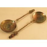 A pair of Victorian silver plated serving spoons, with Owl finial and engraved bowls, length 8.5ins