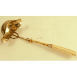 A 19th century ladle, with carved bone handle the double lipped bowl engraved with initials,