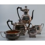 A Walker and Hall silver plated four piece tea set, together with another silver plated two