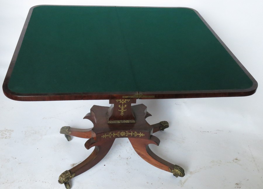 A 19th century rosewood and cut brass fold over games table, raised on an inlaid column to a - Image 2 of 3