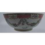 A 19th century porcelain punch bowl, possible Sampson of Paris, the interior decorated with Drink