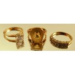 A single stone ring, stamped '14k', 2.6g gross, together with two 9 carat gold stone set dress