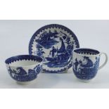 A First Period Worcester trio, comprising cup, tea bowl and saucer, all decorated in the Fisherman