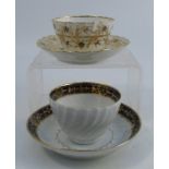 A Flight period Worcester tea bowl and saucer, decorated in blue and gilt to a white ground,