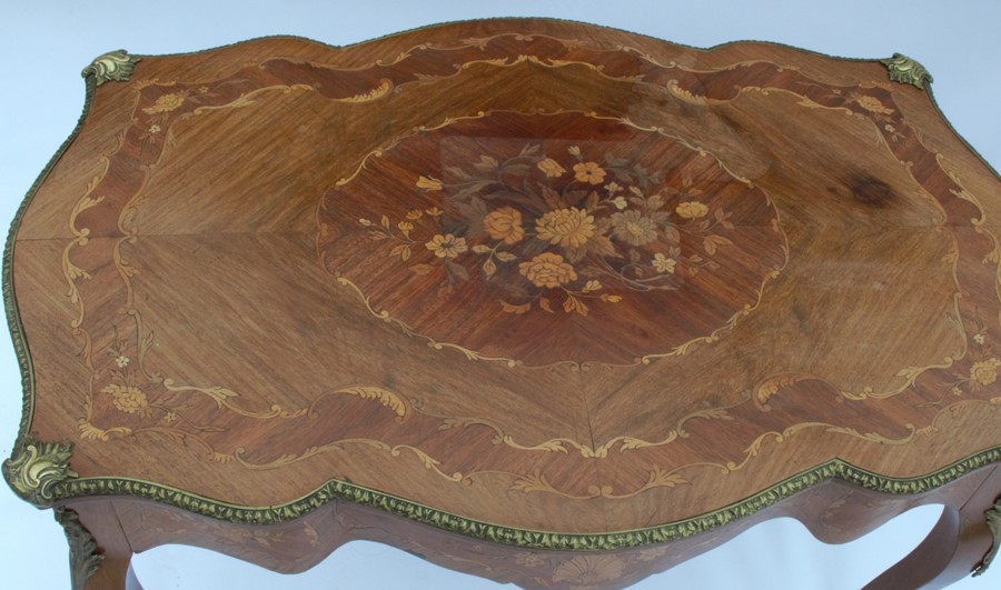 A 19th century style marquetry double serpentine sided centre table, with a central marquetry - Image 3 of 4