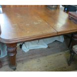 A 19th century oak extending dining table, with three leaves, closed 52ins x 56ins, length with