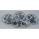 Three First period Worcester porcelain saucers, together with two tea bowls, decorated in the