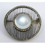 An Edwardian moonstone and rose diamond brooch, circa 1905, the round cabochon approximately 11mm