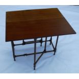 A 19th century mahogany spider leg occasional table, of rectangular form, raised on turned supports,