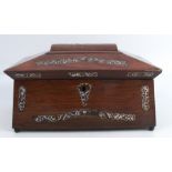 A 19th century rosewood sarcophagus shaped tea caddy, with mother of pearl inlay, the interior