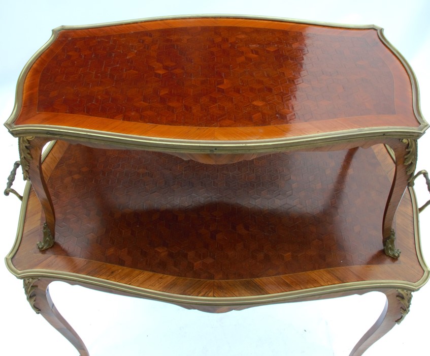 A 19th century kingwood two tier table, with parquetry inlay and gilt metal mounts, the larger table - Image 2 of 4