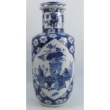 An Oriental blue and white vase, decorated with vases and pots in a shaped reserve, surrounded by