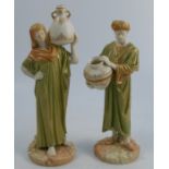 A pair of Royal Worcester shot enamel figures, of Eastern Water Carriers, model number 1250,