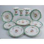 A 19th century English porcelain part dessert service, comprising four plates, a pair of circular